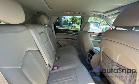 2015 Cadillac Srx Luxury Collection z USA, uszkodzony, nr VIN 3GYFNBE37FS569840